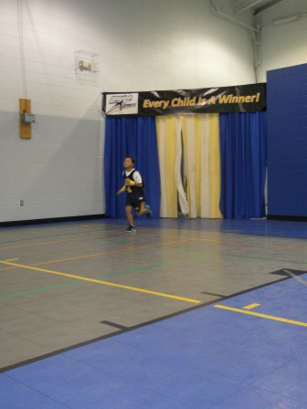 Kasen taking the floor at basketball game